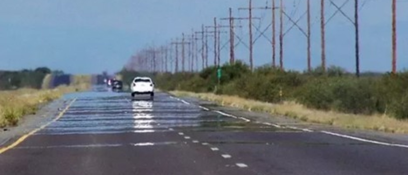 Cars driving down a highway